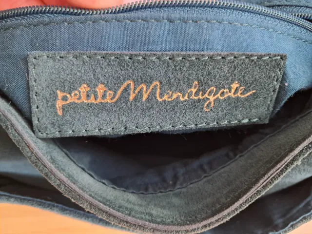 Bolso bandolera verde azulado.