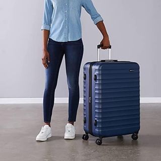 Maleta Amazon Basics Rígida Giratoria Azul