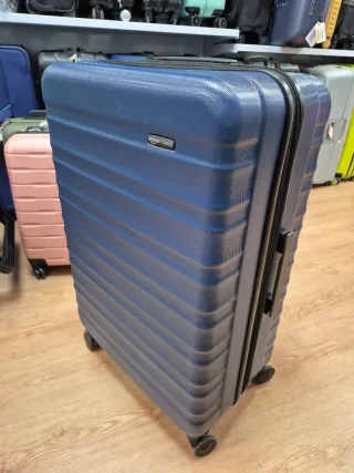 Maleta Amazon Basics Rígida Giratoria Azul