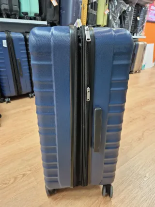 Maleta Amazon Basics Rígida Giratoria Azul