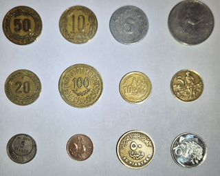 Lotto 12 monete stati africani. Vedi descr.e foto.