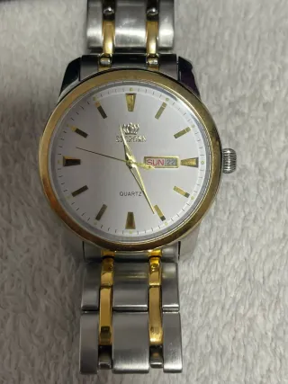 Reloj Citizen Scrown Oro y Plata