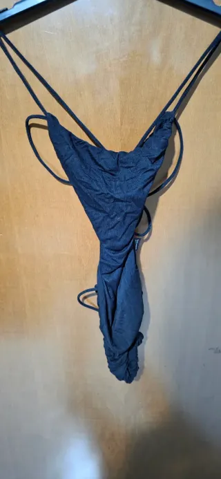 Body con schiena scoperta e intrecci