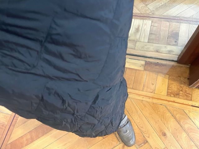 Abrigo Uniqlo negro acolchado