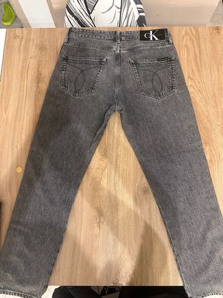 Jeans Calvin Klein grigi con banda laterale