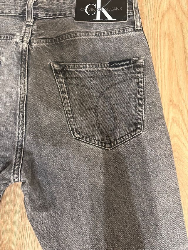 Jeans Calvin Klein grigi con banda laterale