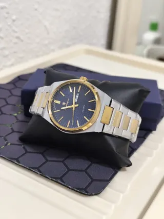 Reloj poedagar Hombre Azul y Dorado