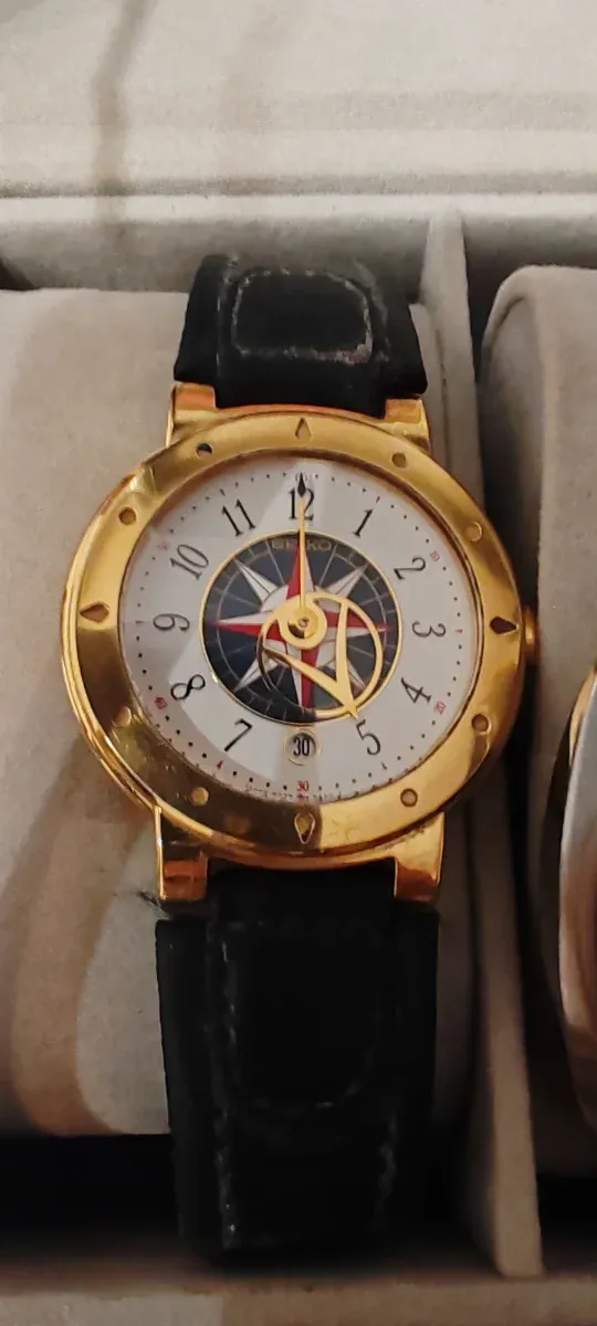 Reloj Seiko Dorado y Negro