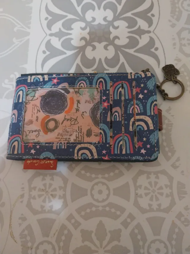 Monedero con diseño de castillo y globo