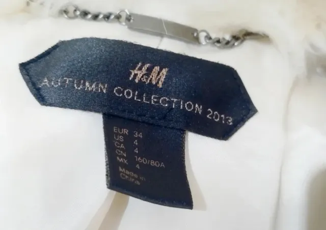 Abrigo pelo sintético. H&M Colección Studio 2013.