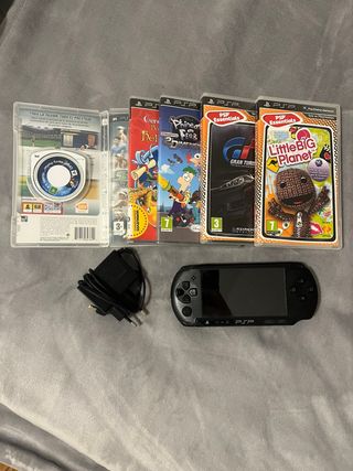 Console PSP + caricabatterie+5 giochi