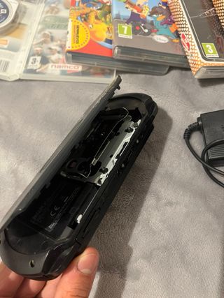 Console PSP + caricabatterie+5 giochi