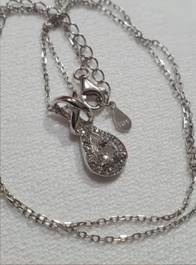 Colgante ORO BLANCO Y SWAROVSKIS