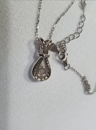 Colgante ORO BLANCO Y SWAROVSKIS 
