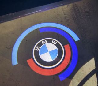 Luces cortesía logo BMW