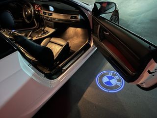 Luces cortesía logo BMW