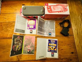 Nintendo Switch Lite Corallo + Giochi