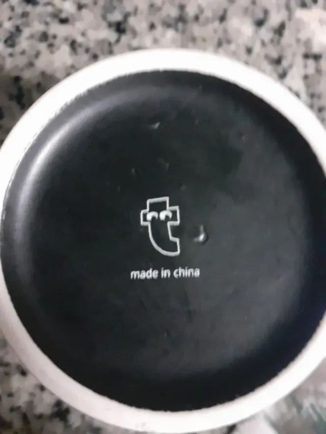 Taza negra rayas blancas apta para microondas