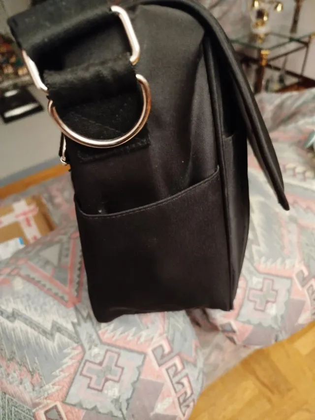 Bolso negro para silla de bebé