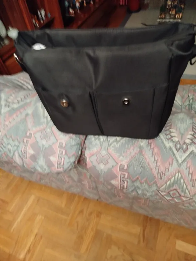 Bolso negro para silla de bebé