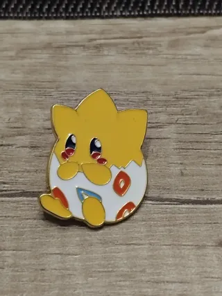 Pin metálico Pokémon Togepi – diseño coleccionista