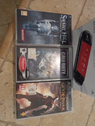 PSP Slim & Lite Nera + 3 Giochi