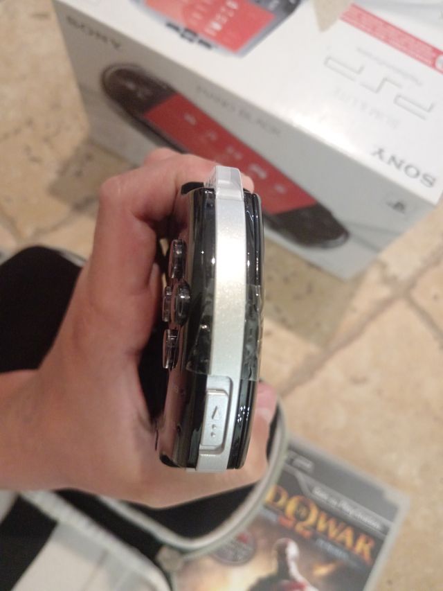 PSP Slim & Lite Nera + 3 Giochi