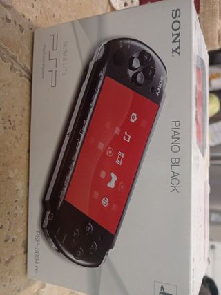 PSP Slim & Lite Nera + 3 Giochi