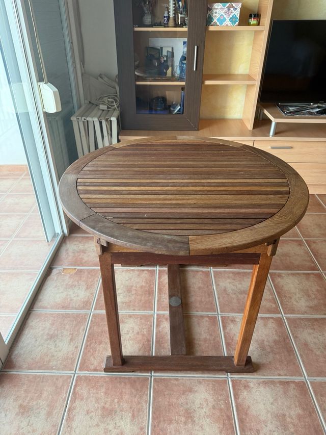 Mesa redonda de madera ampliable