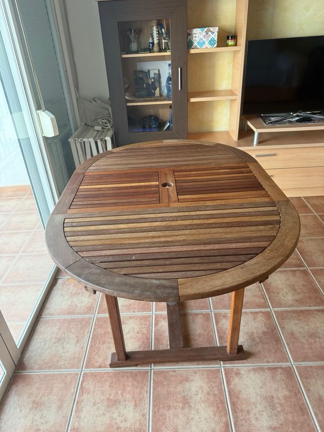 Mesa redonda de madera ampliable