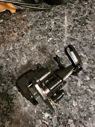 Pinza freno trasera yamaha raptor