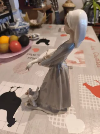 Figura porcelana Lladro niña con perro