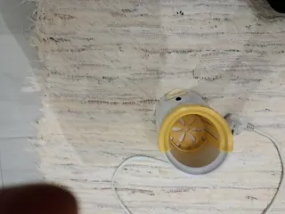 Calienta biberones blanco y amarillo