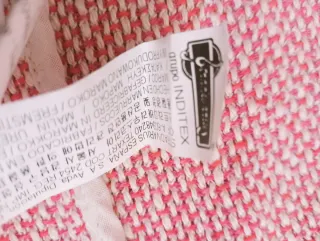 Chaqueta rosa y blanca