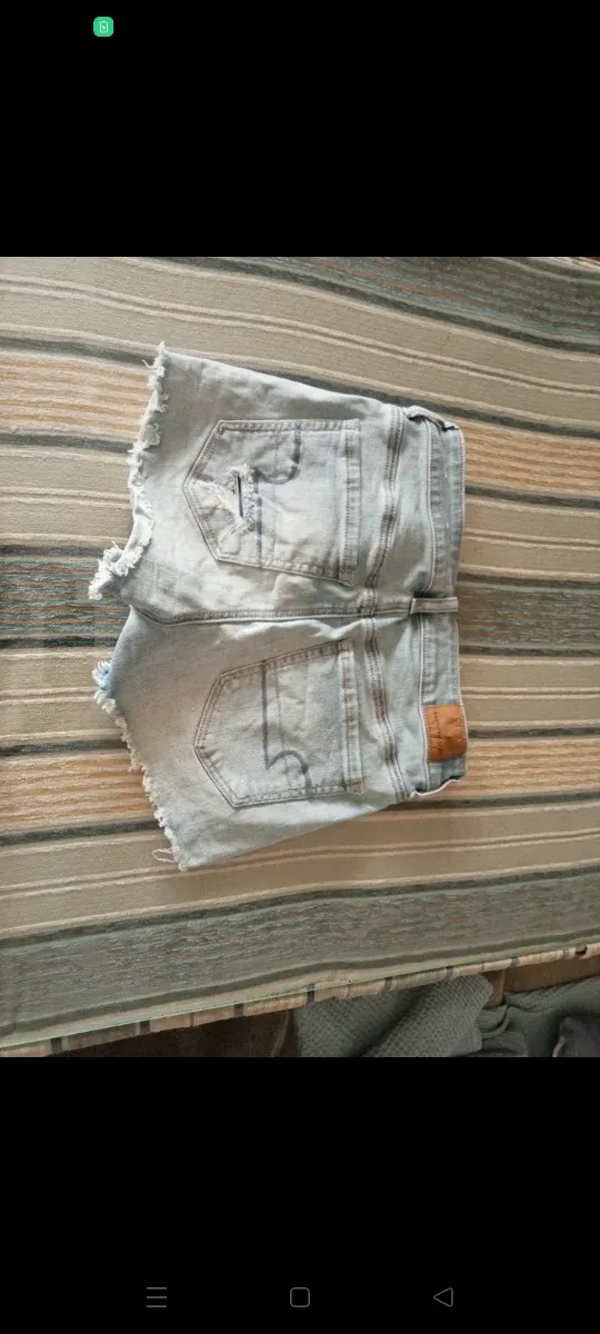 Pantalón corto vaquero roto blanco