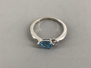 anillo oro 18k con piedra con diamante,topacio