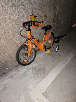 Bicicleta infantil naranja talla 14