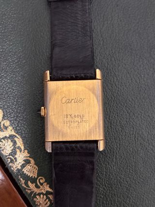 Reloj Cartier Negro y Dorado