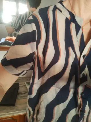 Blusa animal print beige y azul