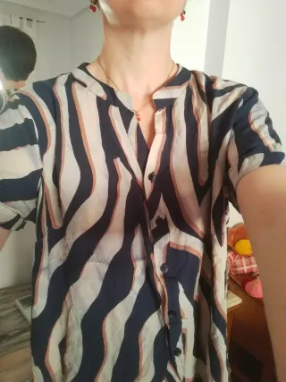 Blusa animal print beige y azul