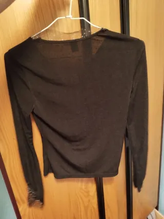 Blusa manga larga  con pedrería edición Limitada 