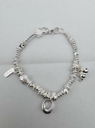 Pulsera Plata con Dijes