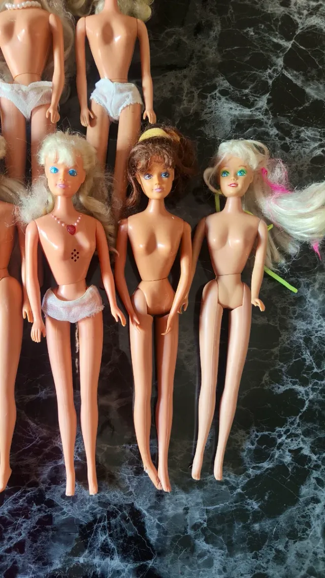 8 Barbie bambole