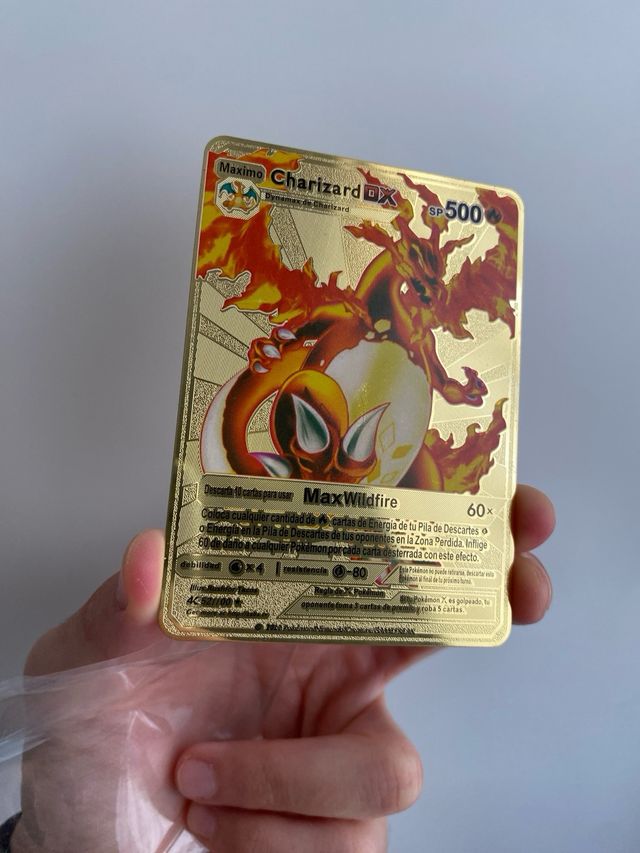 Carta Pokémon Oro Charizard DX SP 500