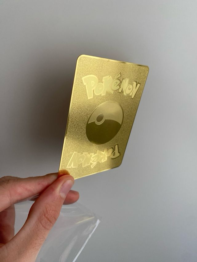 Carta Pokémon Oro Charizard DX SP 500