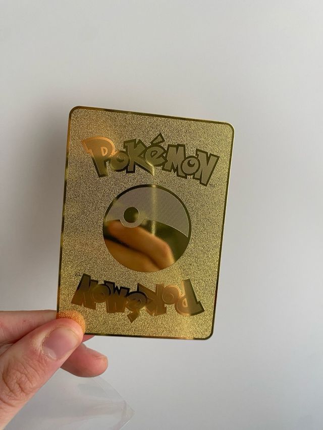 Carta Pokémon Oro Charizard DX SP 500