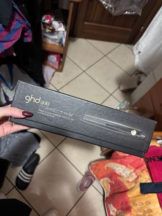 Piastra per capelli ghd gold nera
ben tenuta 