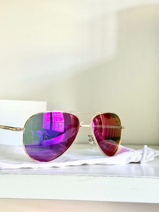 Gafas de sol Polaroid rosas y moradas de niña 