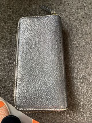 Cartera Tous piel negra y dorada