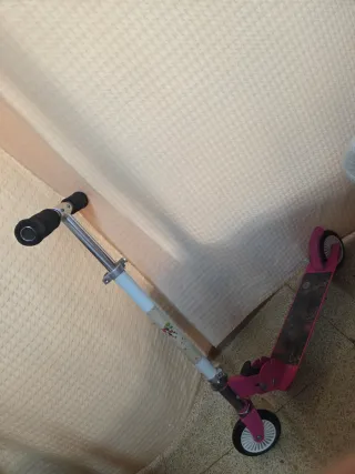 Patinete rosa buen estado
